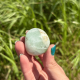 Pierre roulée en apophyllite verte et stilbite